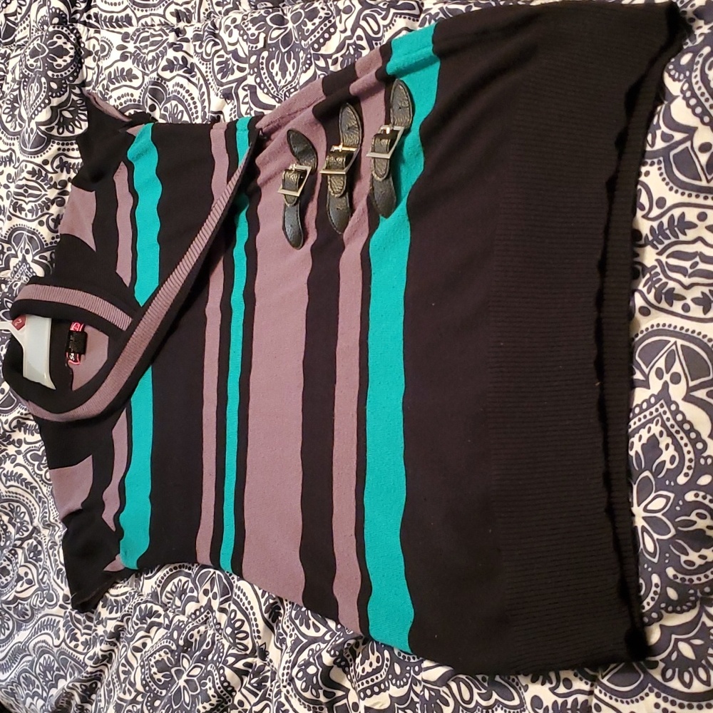 Vintage striped dress with 3 buckles in the front.